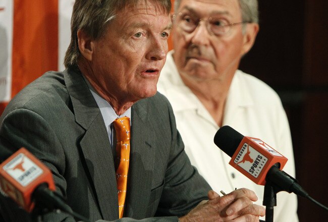 AUSTIN, TX - JUNE 15:  University of Texas at Austin President William Powers Jr., left, and Men's Athletics Director DeLoss Dodds  announce the athletics programs will continue competing in the Big 12 Conference June 15, 2010 in Austin, Texas.  (Photo by Erich Schlegel/Getty Images)