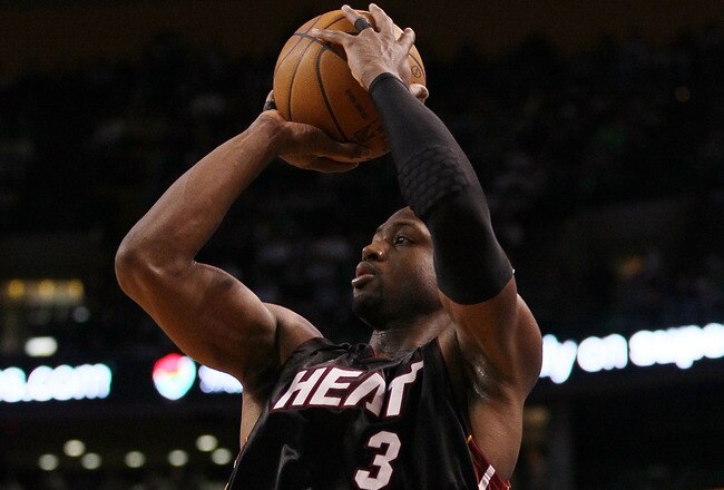 BOSTON - APRIL 27:  Dwyane Wade #3 of the Miami Heat shoots a three point shot in the second half against the Boston Celtics during Game Five of the Eastern Conference Quarterfinals of the 2010 NBA playoffs at the TD Garden on April 27, 2010 in Boston, Massachusetts. The Celtics defeated the Heat 96-86 to win the series. NOTE TO USER: User expressly acknowledges and agrees that, by downloading and or using this photograph, User is consenting to the terms and conditions of the Getty Images License Agreement.  (Photo by Elsa/Getty Images)