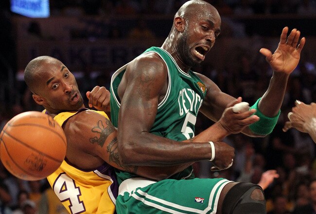 LOS ANGELES, CA - JUNE 15:  Kevin Garnett #5 of the Boston Celtics and Kobe Bryant #24 of the Los Angeles Lakers battle for the ball in the first period of Game Six of the 2010 NBA Finals at Staples Center on June 15, 2010 in Los Angeles, California.  NOTE TO USER: User expressly acknowledges and agrees that, by downloading and/or using this Photograph, user is consenting to the terms and conditions of the Getty Images License Agreement.  (Photo by Ronald Martinez/Getty Images)