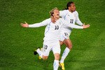 PRETORIA, SOUTH AFRICA - JUNE 16:  Diego Forlan of Uruguay celebrates after scoring the opening goal with team mate Alvaro Pereira (R) during the 2010 FIFA World Cup South Africa Group A match between South Africa and Uruguay at Loftus Versfeld Stadium on June 16, 2010 in Tshwane/Pretoria, South Africa.  (Photo by Stuart Franklin/Getty Images)