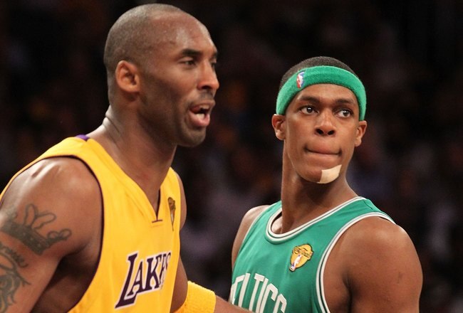LOS ANGELES, CA - JUNE 15:  Rajon Rondo #9 of the Boston Celtics looks on as he stands next to Kobe Bryant #24 of the Los Angeles Lakers in Game Six of the 2010 NBA Finals at Staples Center on June 15, 2010 in Los Angeles, California.  NOTE TO USER: User expressly acknowledges and agrees that, by downloading and/or using this Photograph, user is consenting to the terms and conditions of the Getty Images License Agreement.  (Photo by Ronald Martinez/Getty Images)