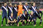 RUSTENBURG, SOUTH AFRICA - JUNE 12:  The USA team (back row L-R) Clint Dempsey, Carlos Bocanegra, Ricardo Clark, Tim Howard, Oguchi Onyewu and Jay Demerit and (front row L-R) Steve Cherundolo, Landon Donovan, Robbie Findley, Michael Bradley and Jozy Altidore of the United States pose for a team photo during the 2010 FIFA World Cup South Africa Group C match between England and USA at the Royal Bafokeng Stadium on June 12, 2010 in Rustenburg, South Africa.  (Photo by Kevork Djansezian/Getty Images)