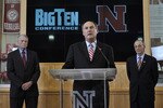 LINCOLN, NE  Ð  JUNE 11:  Big Ten Conference Commissioner James Delany (C), flanked by (L) University of Nebraska Athletic Director Tom Osbourne and Chancellor Harvey Pearlman (R) inform members of the media that the university has accepted an invitation to join the Big Ten Conference  June 11, 2010 in Lincoln, Nebraska.  The university will begin integration immediately and start athletic competition as soon as 2011. (Photo by Eric Francis/Getty Images)
