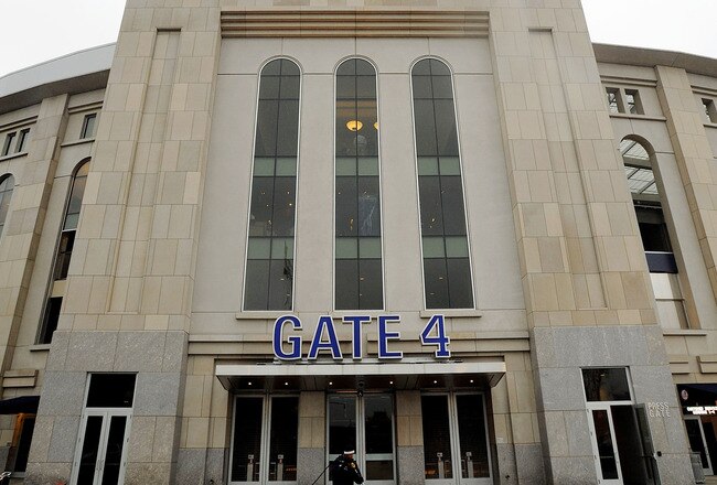NEW YORK - OCTOBER 27:  A worker power washes the Yankee logo outside of Gate 4 a day before Game One of the 2009 MLB World Series between the New York Yankees and the Philadelphia Phillies at Yankee Stadium on October 27, 2009 in the Bronx borough of New York City.  (Photo by Michael Heiman/Getty Images)