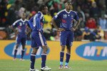 POLOKWANE, SOUTH AFRICA - JUNE 17: Abou Diaby and Sidney Govou of France look dejected following the first goal by Javier Hernandez of Mexico during the 2010 FIFA World Cup South Africa Group A match between France and Mexico at the Peter Mokaba Stadium on June 17, 2010 in Polokwane, South Africa.  (Photo by Ezra Shaw/Getty Images)