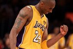 LOS ANGELES, CA - JUNE 17:  Kobe Bryant #24 of the Los Angeles Lakers celebrates in the final moments of the Lakers victory over the Boston Celtics in Game Seven of the 2010 NBA Finals at Staples Center on June 17, 2010 in Los Angeles, California.  NOTE TO USER: User expressly acknowledges and agrees that, by downloading and/or using this Photograph, user is consenting to the terms and conditions of the Getty Images License Agreement.  (Photo by Christian Petersen/Getty Images)
