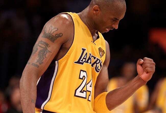 LOS ANGELES, CA - JUNE 17:  Kobe Bryant #24 of the Los Angeles Lakers celebrates in the final moments of the Lakers victory over the Boston Celtics in Game Seven of the 2010 NBA Finals at Staples Center on June 17, 2010 in Los Angeles, California.  NOTE TO USER: User expressly acknowledges and agrees that, by downloading and/or using this Photograph, user is consenting to the terms and conditions of the Getty Images License Agreement.  (Photo by Christian Petersen/Getty Images)