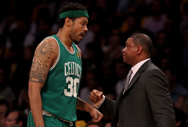 LOS ANGELES, CA - JUNE 17:  Rasheed Wallace #30 walksk to the bench past head coach Doc Rivers of the Boston Celtics in the first half against the Los Angeles Lakers in Game Seven of the 2010 NBA Finals at Staples Center on June 17, 2010 in Los Angeles, California.  NOTE TO USER: User expressly acknowledges and agrees that, by downloading and/or using this Photograph, user is consenting to the terms and conditions of the Getty Images License Agreement.  (Photo by Christian Petersen/Getty Images)