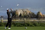 PEBBLE BEACH, CA - JUNE 17:  Tiger Woods hits his tee shot on the 18th hole during the first round of the 110th U.S. Open at Pebble Beach Golf Links on June 17, 2010 in Pebble Beach, California.  (Photo by Jeff Gross/Getty Images)