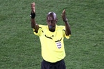 JOHANNESBURG, SOUTH AFRICA - JUNE 18: Referee Koman Coulibaly blows the fianl whistle during the 2010 FIFA World Cup South Africa Group C match between Slovenia and USA at Ellis Park Stadium on June 18, 2010 in Johannesburg, South Africa.  (Photo by Christof Koepsel/Getty Images)