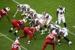 GLENDALE, AZ - DECEMBER 27:  Quarterback Keith Null #9 of the St. Louis Rams snaps the ball against the Arizona Cardinals during the NFL game at the Universtity of Phoenix Stadium on December 27, 2009 in Glendale, Arizona.  The Cardinals defeated the Rams 31-10.  (Photo by Christian Petersen/Getty Images)