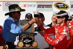 SONOMA, CA - JUNE 21: Team Owner Richard Petty (L) celebrates with his winning driver Kasey Kahne (R), driver of the #9 Budweiser Dodge, after Kasey wins the NASCAR Sprint Cup Series Toyota/Save Mart 350 at the Infineon Raceway on June 21, 2009 in Sonoma, California.  (Photo by Ezra Shaw/Getty Images for NASCAR)