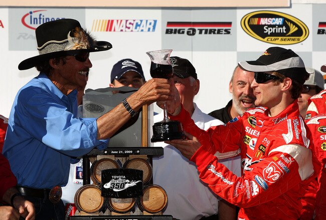 SONOMA, CA - JUNE 21: Team Owner Richard Petty (L) celebrates with his winning driver Kasey Kahne (R), driver of the #9 Budweiser Dodge, after Kasey wins the NASCAR Sprint Cup Series Toyota/Save Mart 350 at the Infineon Raceway on June 21, 2009 in Sonoma, California.  (Photo by Ezra Shaw/Getty Images for NASCAR)