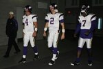GLENDALE, AZ - DECEMBER 6:  Quarterbacks  Brett Favre #4, Sage Rosenfels #2 and Tarvaris Jackson #7 of the Minnesota Vikings walk through the tunnel before the game against the Arizona Cardinals at University of Phoenix Stadium on December 6, 2009 in Glendale, Arizona.  (Photo by Christian Petersen/Getty Images)