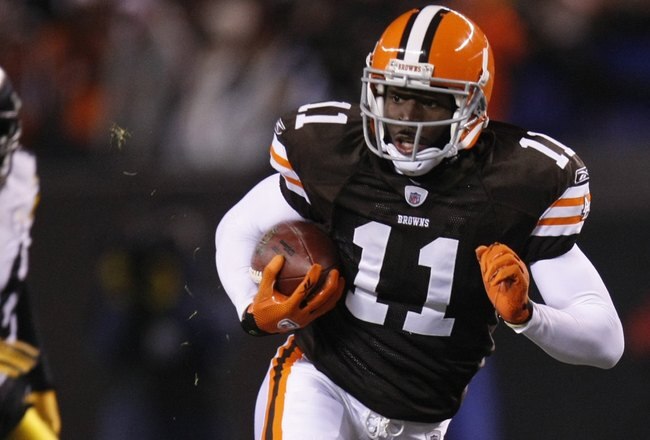 CLEVELAND - DECEMBER 10:  Mohamed Massaquoi #11 of the Cleveland Browns runs with the ball during the game against the Pittsburgh Steelers on December 10, 2009 at Cleveland Browns Stadium in Cleveland, Ohio. Cleveland won the game 13-6.  (Photo by Gregory Shamus/Getty Images)