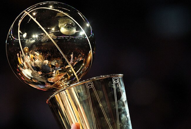 LOS ANGELES, CA - JUNE 17:  The Los Angeles Lakers hold up the Larry O'Brien Trophy after the Lakers defeated the Boston Celtics in Game Seven of the 2010 NBA Finals at Staples Center on June 17, 2010 in Los Angeles, California.  NOTE TO USER: User expressly acknowledges and agrees that, by downloading and/or using this Photograph, user is consenting to the terms and conditions of the Getty Images License Agreement.  (Photo by Ronald Martinez/Getty Images)