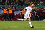 PRETORIA, SOUTH AFRICA - JUNE 19:  Dennis Rommedahl of Denmark celebrates scoring his team's second goal during the 2010 FIFA World Cup South Africa Group E match between Cameroon and Denmark at Loftus Versfeld Stadium on June 19, 2010 in Tshwane/Pretoria, South Africa.  (Photo by Cameron Spencer/Getty Images)