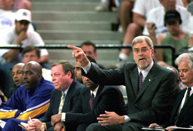 30 Apr 2000: Coach Phil Jackson of the Los Angeles Lakers points to his team from the bench during the game against the Sacramento Kings for the NBA Western Conference Playoffs Round One Game at the Arco Arena in Sacramento, California. The Kings defeated the Lakers 99-91.   Mandatory Credit: Jed Jacobsohn  /Allsport