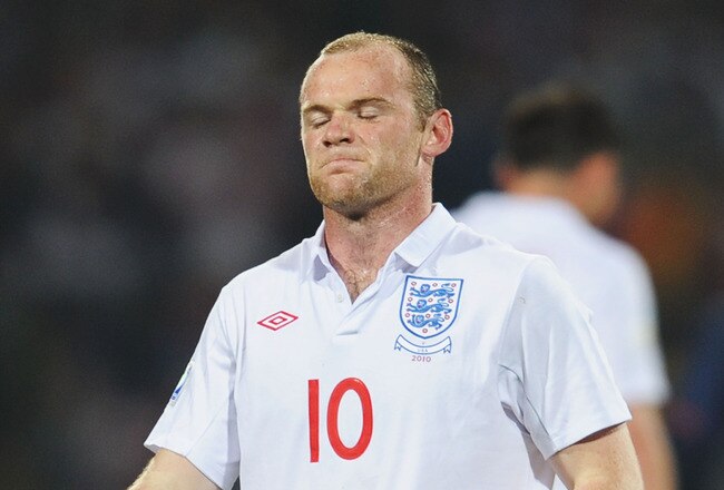 RUSTENBURG, SOUTH AFRICA - JUNE 12:  Wayne Rooney of England looks dejected after missing a chance during the 2010 FIFA World Cup South Africa Group C match between England and USA at the Royal Bafokeng Stadium on June 12, 2010 in Rustenburg, South Africa.  (Photo by Michael Regan/Getty Images)