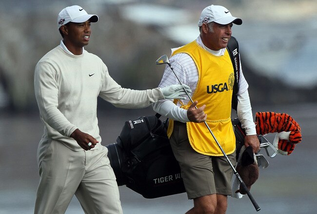PEBBLE BEACH, CA - JUNE 19:  Tiger Woods walks with his caddie Steve Williams after hitting his approach shot on the 18th hole during the third round of the 110th U.S. Open at Pebble Beach Golf Links on June 19, 2010 in Pebble Beach, California.  (Photo by Stephen Dunn/Getty Images)