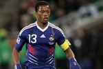 POLOKWANE, SOUTH AFRICA - JUNE 17:  Patrice Evra of France runs with the ball during the 2010 FIFA World Cup South Africa Group A match between France and Mexico at the Peter Mokaba Stadium on June 17, 2010 in Polokwane, South Africa.  (Photo by Christof Koepsel/Getty Images)