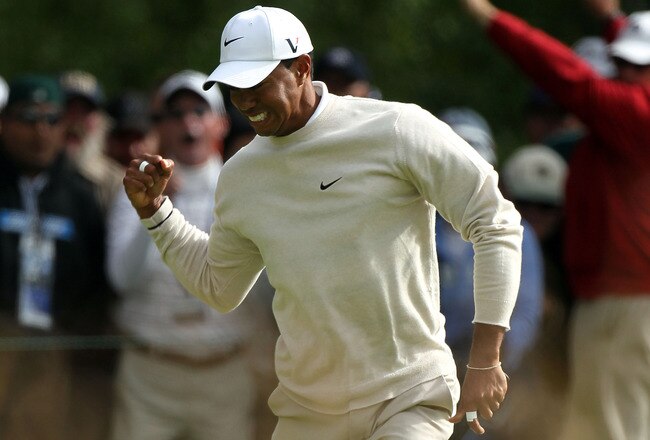 PEBBLE BEACH, CA - JUNE 19:  Tiger Woods  celebrates a birdie putt on the 16th green during the third round of the 110th U.S. Open at Pebble Beach Golf Links on June 19, 2010 in Pebble Beach, California.  (Photo by Stephen Dunn/Getty Images)