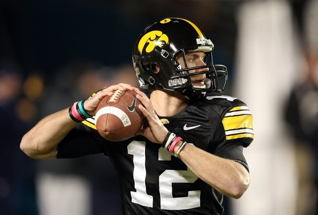 MIAMI GARDENS, FL - JANUARY 05:  Ricky Stanzi #12 of the Iowa Hawkeyes warms up against the Georgia Tech Yellow Jackets during the FedEx Orange Bowl at Land Shark Stadium on January 5, 2010 in Miami Gardens, Florida. Iowa won 24-14. (Photo by Streeter Lecka/Getty Images)