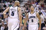 SALT LAKE CITY - MAY 10:  Deron Williams #8 and Carlos Boozer #5 of the Utah Jazz look on against the Los Angeles Lakers during Game Four of the Western Conference Semifinals of the 2010 NBA Playoffs on May 10, 2010 at Energy Solutions Arena in Salt Lake City, Utah. NOTE TO USER: User expressly acknowledges and agrees that, by downloading and or using this Photograph, user is consenting to the terms and conditions of the Getty Images License Agreement.  (Photo by Jed Jacobsohn/Getty Images)