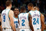 NEW ORLEANS - MARCH 31:  Chris Paul #3 of the New Orleans Hornets talks with his team during a timeout against the Washington Wizards at New Orleans Arena on March 31, 2010 in New Orleans, Louisiana.  The Wizards defeated the Hornets 96-91.  NOTE TO USER: User expressly acknowledges and agrees that, by downloading and/or using this Photograph, User is consenting to the terms and conditions of the Getty Images License Agreement.  (Photo by Chris Graythen/Getty Images)