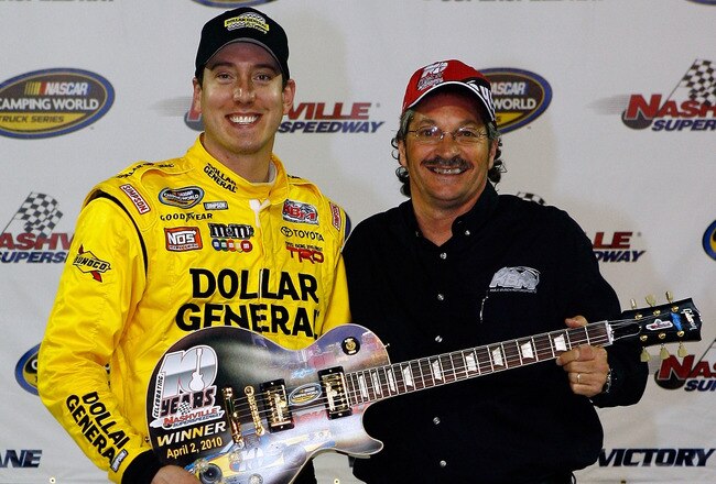 LEBANON, TN - APRIL 02:  Kyle Busch, driver of the #18 Dollar General Toyota celebrates in victory lane with competition director Rick Ren, after winning the NASCAR Camping World Truck Series Nashville 200 at Nashville Superspeedway on April 2, 2010 in Lebanon, Tennessee.  (Photo by Jason Smith/Getty Images for NASCAR)