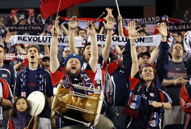FOXBORO, MA - MAY 29:  New England Revolution fans cheer on their team in the second half against the New York Red Bulls on May 29, 2010 at Gillette Stadium in Foxboro, Massachusetts. The Revolution defeated the Red Bulls 3-2.  (Photo by Elsa/Getty Images)