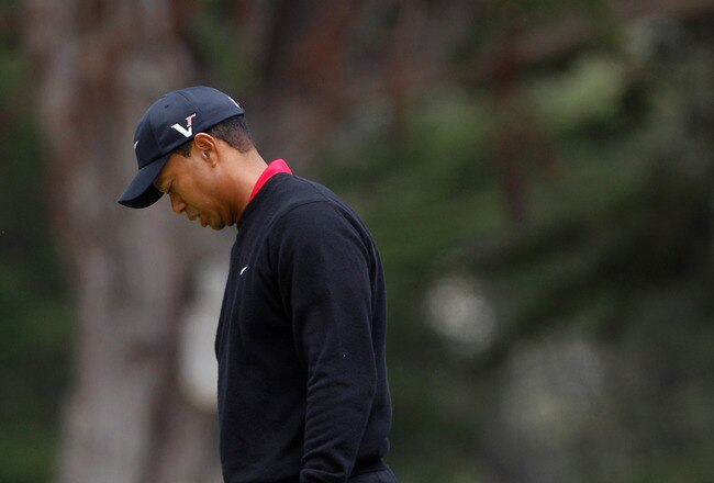 PEBBLE BEACH, CA - JUNE 20:  Tiger Woods reacts to making bogey on the first hole during the final round of the 110th U.S. Open at Pebble Beach Golf Links on June 20, 2010 in Pebble Beach, California.  (Photo by Donald Miralle/Getty Images)