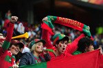 CAPE TOWN, SOUTH AFRICA - JUNE 21:  Portugal fans enjoy the atmosphere ahead of the 2010 FIFA World Cup South Africa Group G match between Portugal and North Korea at the Green Point Stadium on June 21, 2010 in Cape Town, South Africa.  (Photo by Jamie McDonald/Getty Images)