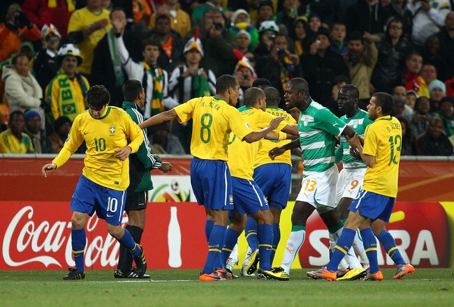 JOHANNESBURG, SOUTH AFRICA - JUNE 20:  Kaka of Brazil pleads his innocence before receiving a second yellow card followed by a red card during the 2010 FIFA World Cup South Africa Group G match between Brazil and Ivory Coast at Soccer City Stadium on June 20, 2010 in Johannesburg, South Africa.  (Photo by Richard Heathcote/Getty Images)