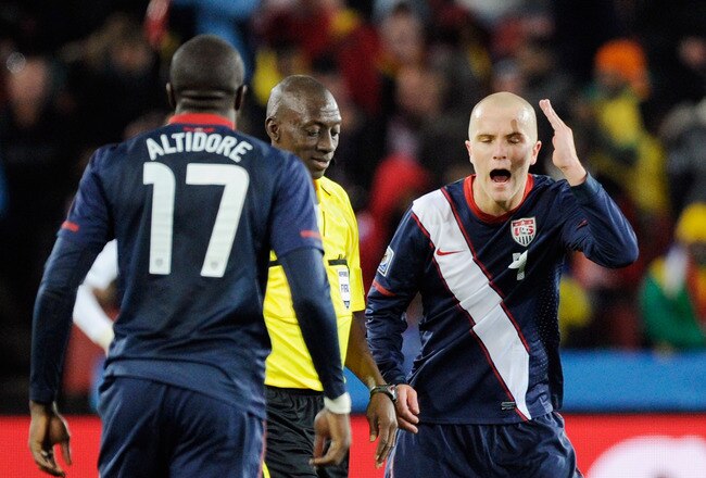 JOHANNESBURG, SOUTH AFRICA - JUNE 18:  Michael Bradley and Jozy Altidore of the United States dispute a decision with Referee Koman Coulibaly during the 2010 FIFA World Cup South Africa Group C match between Slovenia and USA at Ellis Park Stadium on June 18, 2010 in Johannesburg, South Africa.  (Photo by Kevork Djansezian/Getty Images)