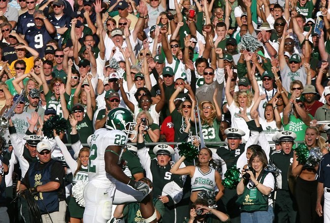 SOUTH BEND, IN - SETPEMBER 19: Larry Caper #22 of the Michigan State Spartans scores a touchdown against the Notre Dame Fighting Irish on September 19, 2009 at Notre Dame Stadium in South Bend, Indiana. Notre Dame defeated Michigan State 33-30. (Photo by Jonathan Daniel/Getty Images)