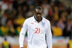 CAPE TOWN, SOUTH AFRICA - JUNE 18:  Emile Heskey of England walks off the pitch as he is substituted during the 2010 FIFA World Cup South Africa Group C match between England and Algeria at Green Point Stadium on June 18, 2010 in Cape Town, South Africa.  (Photo by Michael Regan/Getty Images)