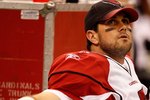 NEW ORLEANS - JANUARY 16:  Quarterback Matt Leinart #7 of the Arizona Cardinals looks on from the bench against the New Orleans Saints during the NFC Divisional Playoff Game at Louisana Superdome on January 16, 2010 in New Orleans, Louisiana. The Saints won 45-14.  (Photo by Ronald Martinez/Getty Images)