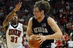 LAS VEGAS - NOVEMBER 18:  Luke Babbitt #5 of the Nevada Reno Wolf Pack drives against Justin Hawkins #31 of the UNLV Rebels during their game at the Thomas & Mack Center November 18, 2009 in Las Vegas, Nevada. UNLV won 88-75.  (Photo by Ethan Miller/Getty Images)