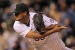 DENVER - APRIL 10:  Relief pitcher Manuel Corpas #60 of the Colorado Rockies delivers against the San Diego Padres during MLB action at Coors Field on April 10, 2010 in Denver, Colorado. Corpas collected the loss as the Padres defeated the Rockies 5-4 in 14 innings.  (Photo by Doug Pensinger/Getty Images)