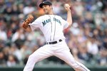SEATTLE - JUNE 02:  Starting pitcher Cliff Lee #36 of the Seattle Mariners pitches against the Minnesota Twins at Safeco Field on June 2, 2010 in Seattle, Washington. (Photo by Otto Greule Jr/Getty Images)