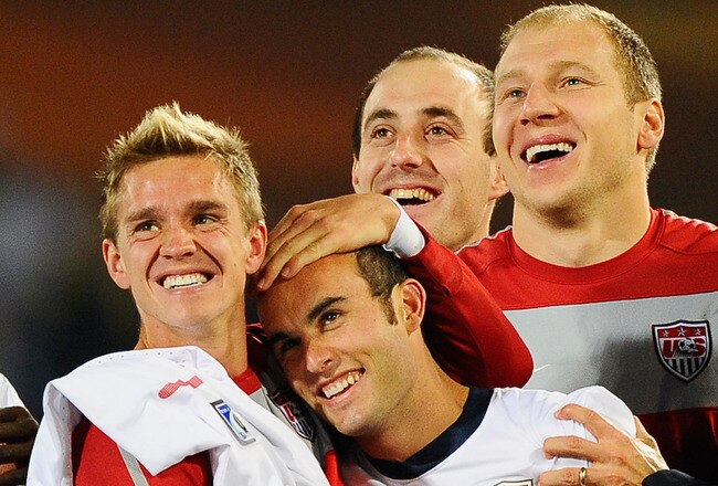 PRETORIA, SOUTH AFRICA - JUNE 23:  Stuart Holden and Landon Donovan of the United States celebrate with team mates the victory that sends the USA through to the second round in the 2010 FIFA World Cup South Africa Group C match between USA and Algeria at the Loftus Versfeld Stadium on June 23, 2010 in Tshwane/Pretoria, South Africa.  (Photo by Kevork Djansezian/Getty Images)