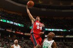 BOSTON - FEBRUARY 27:  Chris Douglas-Roberts #34 of the New Jersey Nets goes up for a dunk against Ray Allen #20 of the Boston Celtics on February 27, 2010 at TD Garden in Boston, Massachusetts.  NOTE TO USER: User expressly acknowledges and agrees that, by downloading and/or using this Photograph, user is consenting to the terms and conditions of the Getty Images License Agreement. (Photo by Elsa/Getty Images)
