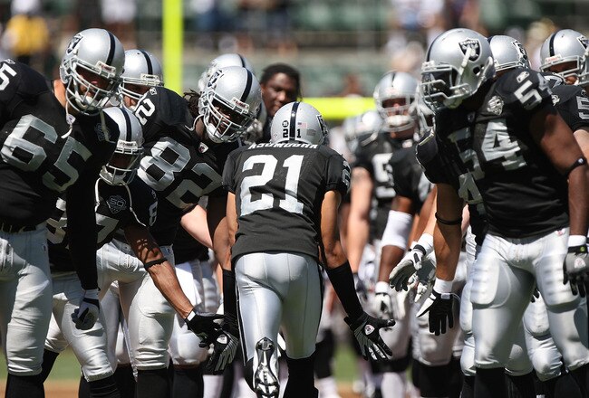 OAKLAND, CA - AUGUST 29:  Nnamdi Asomugha #21 of the Oakland Raiders is introduced against the New Orleans Saints during an NFL preseason game at Oakland-Alameda County Coliseum on August 29, 2009 in Oakland, California.  (Photo by Jed Jacobsohn/Getty Images)