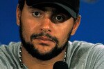 CHICAGO - JUNE 06:  Dustin Byfuglien #33 of the Chicago Blackhawks speaks at a press conference after defeating the Philadelphia Flyers 7-4 in Game Five of the 2010 NHL Stanley Cup Final at the United Center on June 6, 2010 in Chicago, Illinois.  (Photo by Jonathan Daniel/Getty Images)