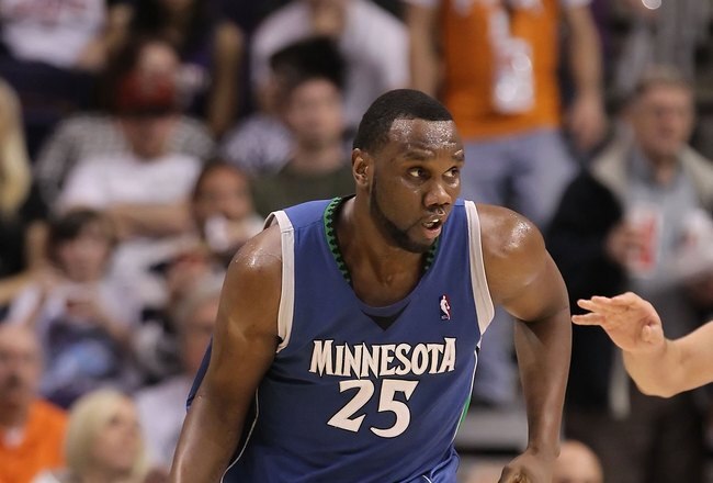 PHOENIX - MARCH 16:  Al Jefferson #25 of the Minnesota Timberwolves handles the ball during the NBA game against the Phoenix Suns at US Airways Center on March 16, 2010 in Phoenix, Arizona. The Suns defeated the Timberwolves 152-114.  NOTE TO USER: User expressly acknowledges and agrees that, by downloading and or using this photograph, User is consenting to the terms and conditions of the Getty Images License Agreement.  (Photo by Christian Petersen/Getty Images)