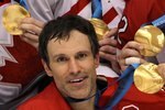 VANCOUVER, BC - FEBRUARY 28:  Scott Niedermayer #27 of Canada poses for a photo after the ice hockey men's gold medal game between USA and Canada on day 17 of the Vancouver 2010 Winter Olympics at Canada Hockey Place on February 28, 2010 in Vancouver, Canada. Canada defeated USA 3-2 in overtime.  (Photo by Bruce Bennett/Getty Images)