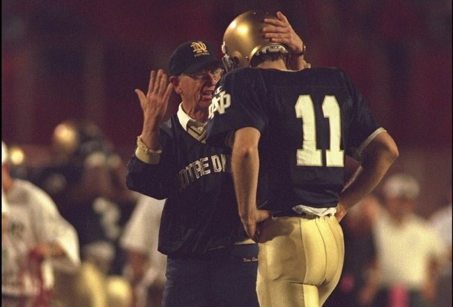 1 Jan 1996:  Head coach Lou Holtz of the Notre Dame Fighting Irish gives some words of encouragement to his quarterback Tom Krug #11 during the Orange Bowl in Miami, Florida.  FSU defeated Notre Dame 31-26.  Mandatory Credit:  Doug Pensinger/Allsport