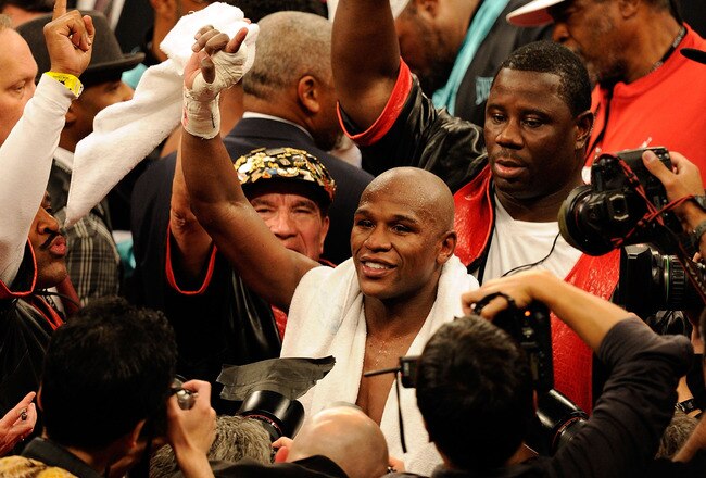 LAS VEGAS - MAY 01:  Floyd Mayweather Jr. reacts after defeating Shane Mosley by unanimous decision after the welterweight fight at the MGM Grand Garden Arena on May 1, 2010 in Las Vegas, Nevada.  (Photo by Ethan Miller/Getty Images)