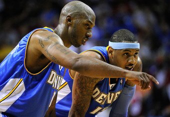 ORLANDO, FL - MARCH 28: Chauncey Billups #1 (L) of the Denver Nuggets speaks with Carmelo Anthony #15 during the game at Amway Arena on March 28, 2010 in Orlando, Florida.  NOTE TO USER: User expressly acknowledges and agrees that, by downloading and/or using this Photograph, user is consenting to the terms and conditions of the Getty Images License Agreement.  (Photo by Sam Greenwood/Getty Images)
